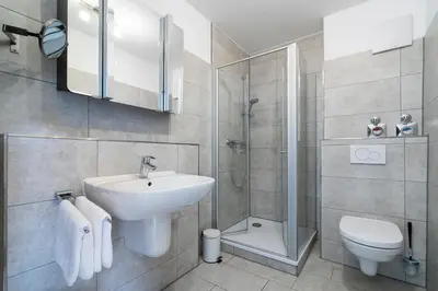 Ein Badezimmer in der Unterkunft Wohnpark am Mühlenteich - Appartement 24