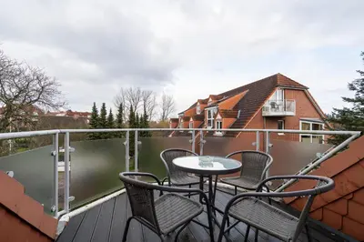 Ein Balkon oder eine Terrasse in der Unterkunft Wohnpark am Mühlenteich - Appartement 24