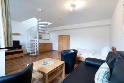 Ein Sitzbereich in der Unterkunft Wohnpark am Mühlenteich - Appartement 27a