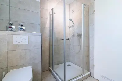 Ein Badezimmer in der Unterkunft Wohnpark am Mühlenteich - Appartement 30