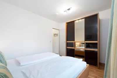 Ein Bett oder Betten in einem Zimmer der Unterkunft Wohnpark am Mühlenteich - Appartement 27