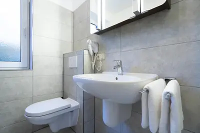 Ein Badezimmer in der Unterkunft Wohnpark am Mühlenteich - Appartement 27
