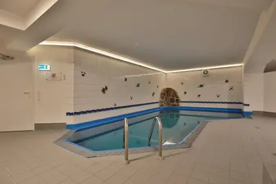 Der Swimmingpool an oder in der Nähe von Haus Windrose Appartement 4