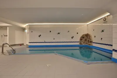 Der Swimmingpool an oder in der Nähe von Haus Windrose Appartement 4