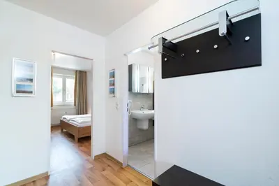 Ein Bett oder Betten in einem Zimmer der Unterkunft Wohnpark am Mühlenteich - Appartement 32