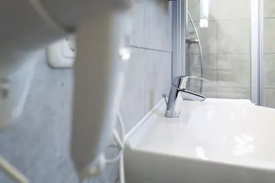 Ein Badezimmer in der Unterkunft Wohnpark am Mühlenteich - Appartement 39
