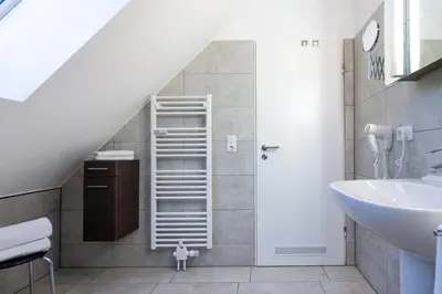 Ein Badezimmer in der Unterkunft Wohnpark am Mühlenteich - Appartement 39