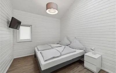 Ein Bett oder Betten in einem Zimmer der Unterkunft Cozy Home In Krems Iiwarderbrück
