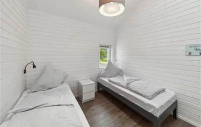 Ein Bett oder Betten in einem Zimmer der Unterkunft Cozy Home In Krems Iiwarderbrück