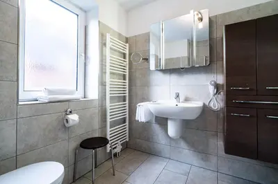 Ein Badezimmer in der Unterkunft Wohnpark am Mühlenteich - Appartement 33