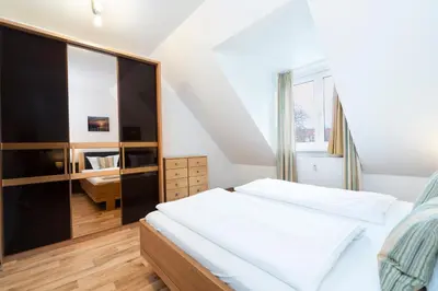 Ein Bett oder Betten in einem Zimmer der Unterkunft Wohnpark am Mühlenteich - Appartement 34