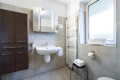 Ein Badezimmer in der Unterkunft Wohnpark am Mühlenteich - Appartement 34
