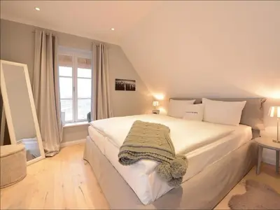 Ein Bett oder Betten in einem Zimmer der Unterkunft Nantucket Blue