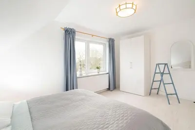 Ein Bett oder Betten in einem Zimmer der Unterkunft Daddeldu