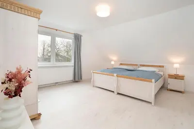 Ein Bett oder Betten in einem Zimmer der Unterkunft Daddeldu