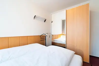 Ein Bett oder Betten in einem Zimmer der Unterkunft Gorch-Fock-Park App 3