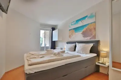 Ein Bett oder Betten in einem Zimmer der Unterkunft Residenz Ostseestrand Appartement 20