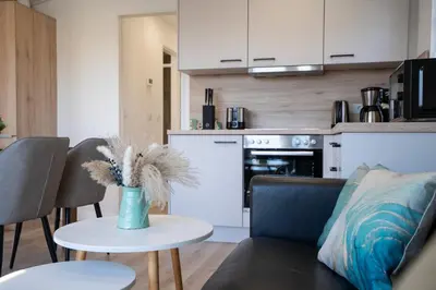 Küche/Küchenzeile in der Unterkunft Ostseecamp Lübecker Bucht Ferienhaus 