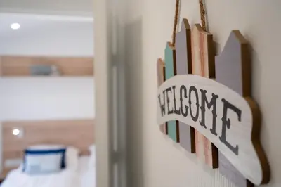 Ein Bett oder Betten in einem Zimmer der Unterkunft Ostseecamp Lübecker Bucht Ferienhaus 
