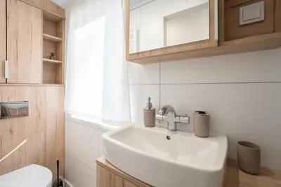 Ein Badezimmer in der Unterkunft Ostseecamp Lübecker Bucht Ferienhaus 