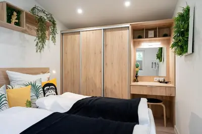 Ein Bett oder Betten in einem Zimmer der Unterkunft Ostseecamp Lübecker Bucht Ferienhaus 