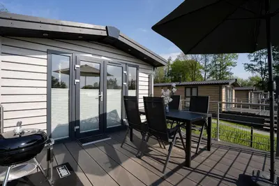 Ein Balkon oder eine Terrasse in der Unterkunft Ostseecamp Lübecker Bucht Ferienhaus 