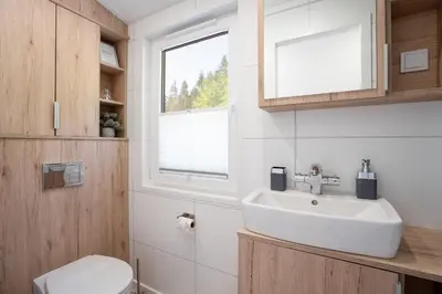Ein Badezimmer in der Unterkunft Ostseecamp Lübecker Bucht Ferienhaus 