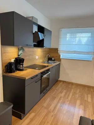 Küche/Küchenzeile in der Unterkunft Hansehaus Lübeck - Gartensuite