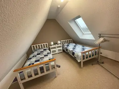 Ein Bett oder Betten in einem Zimmer der Unterkunft Ferienhaus Groß Grönau