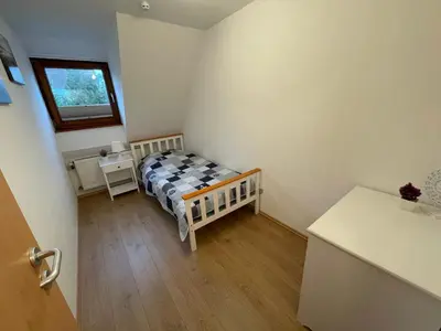 Ein Bett oder Betten in einem Zimmer der Unterkunft Ferienhaus Groß Grönau