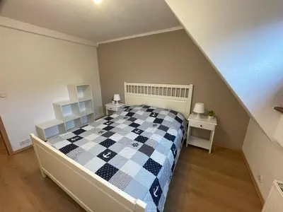 Ein Bett oder Betten in einem Zimmer der Unterkunft Ferienhaus Groß Grönau