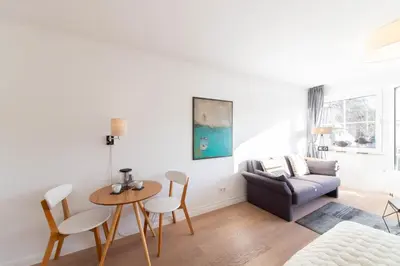 Ein Sitzbereich in der Unterkunft Ferienwohnung Studio Copenhagen Timmendorfer Strand
