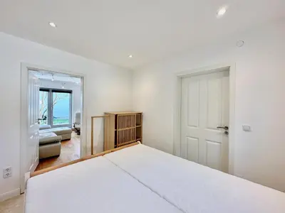 Ein Bett oder Betten in einem Zimmer der Unterkunft Wittinghuus - Urlaub aan de Ostsee