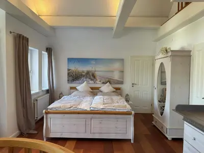 Ein Bett oder Betten in einem Zimmer der Unterkunft Wittinghuus - Urlaub aan de Ostsee