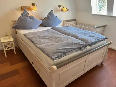 Ein Bett oder Betten in einem Zimmer der Unterkunft Wittinghuus - Urlaub aan de Ostsee