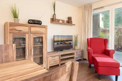 Ein Sitzbereich in der Unterkunft Strandidyll 3