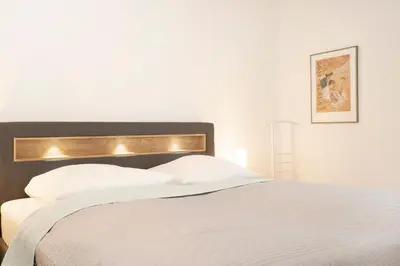 Ein Bett oder Betten in einem Zimmer der Unterkunft Haus Beau Rivage Sundown