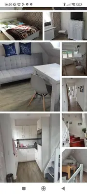 Ein Sitzbereich in der Unterkunft Dachgeschosswohnung Scharbeutz mit Garten
