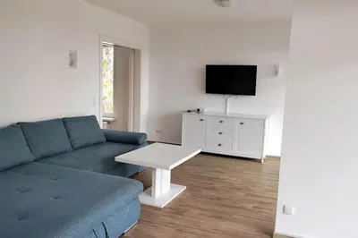 TV/Unterhaltungsangebot in der Unterkunft Erdgeschoss Wohnung mit Garten