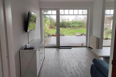 TV/Unterhaltungsangebot in der Unterkunft Erdgeschoss Wohnung mit Garten