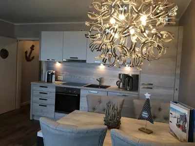 Küche/Küchenzeile in der Unterkunft StrandVILLA Scharbeutz ERSTE REIHE Dünenblick Whg 04