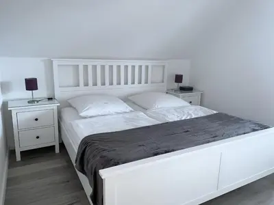 Ein Bett oder Betten in einem Zimmer der Unterkunft Appartementhaus Müller