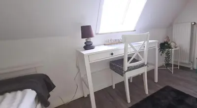 Ein Bett oder Betten in einem Zimmer der Unterkunft Appartementhaus Müller