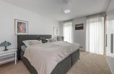 Ein Bett oder Betten in einem Zimmer der Unterkunft Villa am Rethwarder