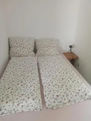 Ein Bett oder Betten in einem Zimmer der Unterkunft Ferienhaus Suda