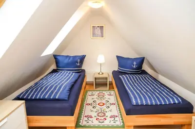 Ein Bett oder Betten in einem Zimmer der Unterkunft Förster Finkenstrasse