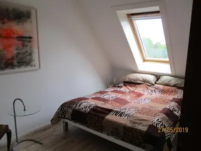 Ein Bett oder Betten in einem Zimmer der Unterkunft Am Kurpark DG. Whg. Nr.22