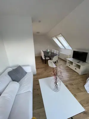 Ein Sitzbereich in der Unterkunft Wasserblick Stadtidyll 3 Zimmer Apartment Lübeck