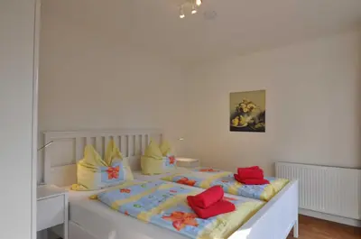 Ein Bett oder Betten in einem Zimmer der Unterkunft Appartementhaus Flori