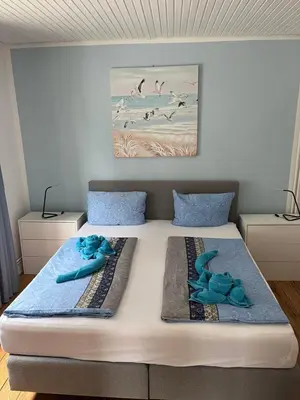 Ein Bett oder Betten in einem Zimmer der Unterkunft Appartementhaus Flori